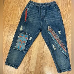 Women’s Blue Distressed Denim Jeans with Embroidered Patchwork
